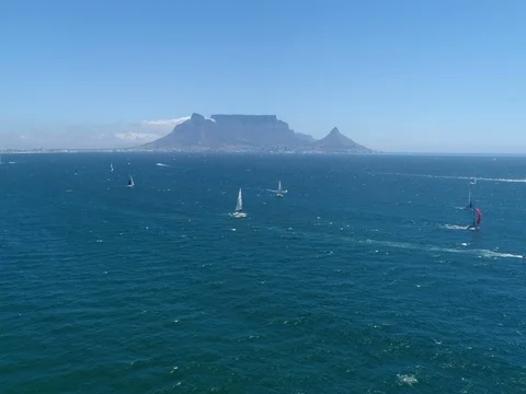 Slow Motion Yachts in Cape 2 Rio Race with Table Mountain in Background Stock Footage 79813717