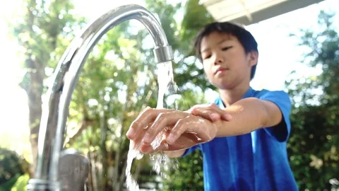  Slow motion young Asian boy washing hand  Stock Footage 88766385