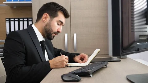 SLOW MOTION. Young businessman checking his watch and then realising he is late Stock Footage 83631672