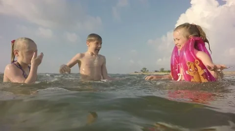 Slow motion. Young children having fun. Stock Footage 64751874