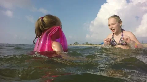 Slow motion. Young children having fun. Stockbeeldmateriaal 64751902