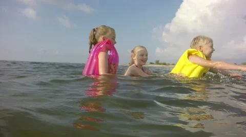 Slow motion. Young children having fun. Video stock 64751936