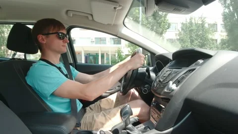 Slow Motion Young Man Driving Stock Footage 156730046