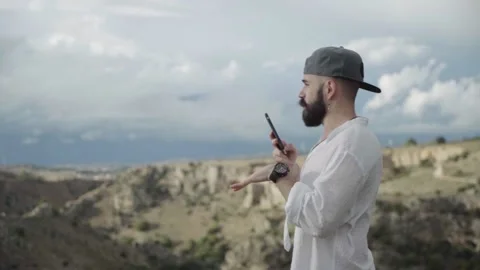 Slow Motion of Young Man Talking On His Smartphone in Matera. Italy Video stock 167139955