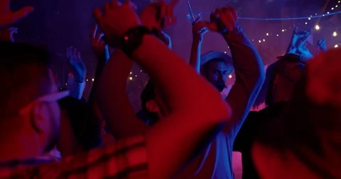 Slow motion young multi-ethnic people during colorful party in different clothes Stock Footage 115392975