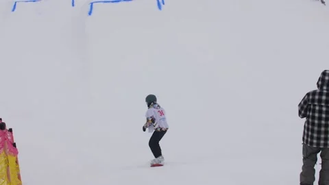 SLOW MOTION: Young pro snowboarder big air Stock Footage 144495697