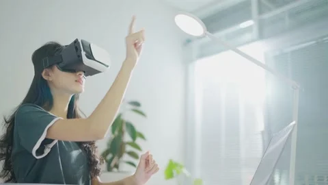 Slow-motion.Female creator content Playing with his hands playing vr. Stock Footage 149825294