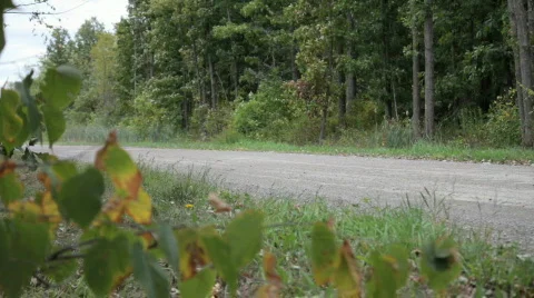 Slow motorcycle pass by2 Stock Footage 842392