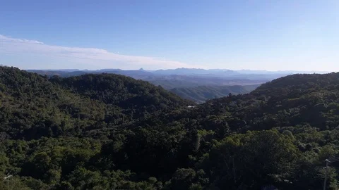 Slow mountain range flyover by drone Stock Footage 77491888