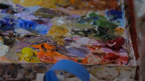 Slow move closeup of spread paint palette Stock Footage 95616104