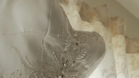 Slow move down beautiful wedding dress close Stock Footage 107246385