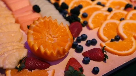 Slow move over tray of fruit salad Stock Footage 107244683