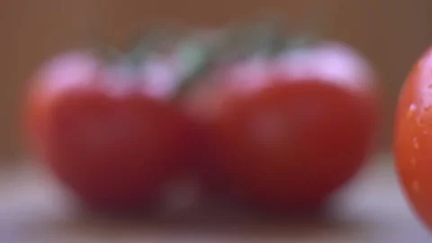 Slow movement of the camera on tomatoes from left to right Видео 132387135