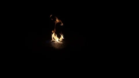 Slow movement of fire on the floor Stock Footage 74570824