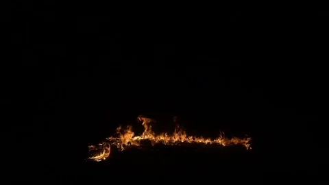 Slow movement of fire on the floor Stock Footage 74570855