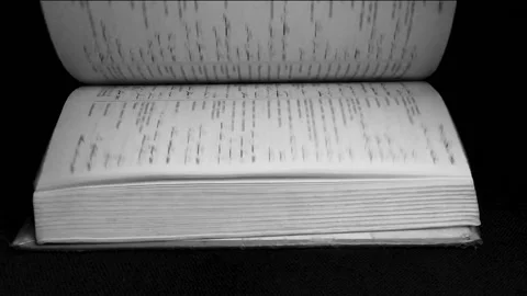 Slow movement of an old book Stock Footage