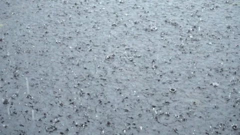 Slow movement of the river surface and wet with rain drops on it Stock-Footage 304495194