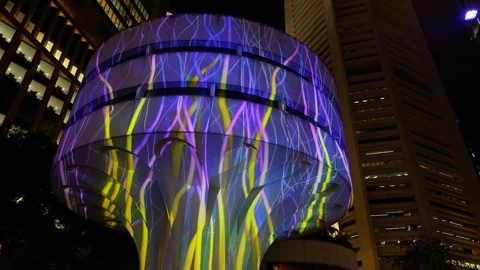Slow movement towards neon projected patterns on modern architecture 6K Stock Footage 311010937