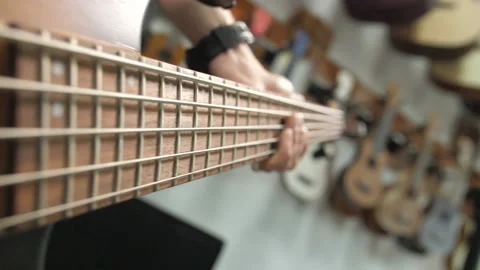 Slow Movement of the Vibrating String on Acoustic Guitar. Stock-Footage 168686563