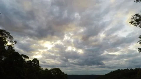 Slow Moving Clouds at Sunset  Stock Footage 66006592