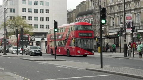 Slow moving heavy traffic outside the Charing Cross station in London. Stock Footage 237932042