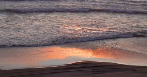 Slow moving ocean waves along the Pacific coast in Orgon during sunset. Stock Footage 254911570