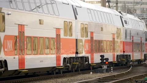 A slow moving passenger train 스톡 동영상 254329406