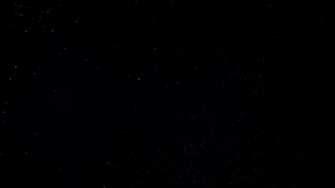 Slow moving real particles on black back... | Stock Video | Pond5