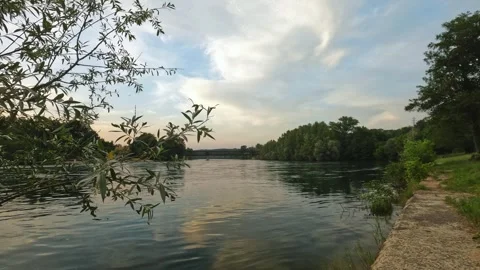 Slow Moving River on a Warm Summer Afternoon Video stock 330088730
