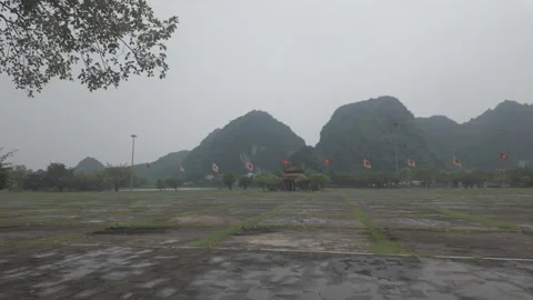 A slow moving shot to the left at Hoa Lu on a cloudy morning Stock Footage 290076501