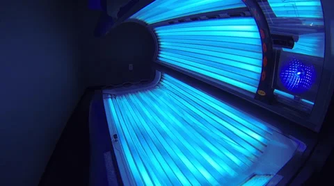 Slow Moving Shot of Powered On Tanning Bed Stock Footage 34755795