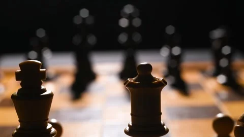 Slow moving shot of white chess pieces on a chessboard. Stock Footage 263706681