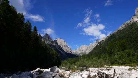 Slow moving timelapse of white clouds forming over the Italian Dolomite Alps Stock Footage 230198947