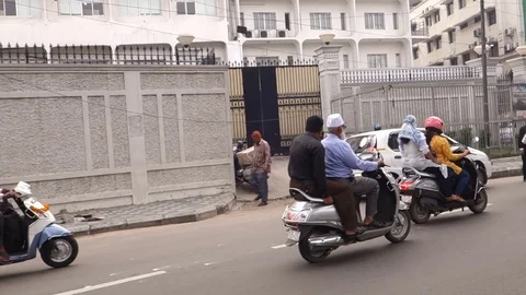 Slow moving two wheeler vehicles in Hyderabad,INDIA Stock Footage 80702380