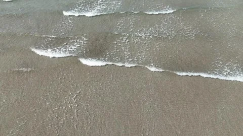 Slow Moving Waves on Beach Drone Shot Stock Footage 342294082