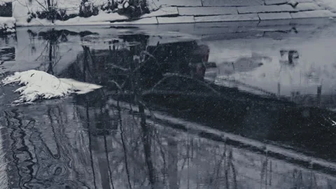 Slow-Moving Winter River With Reflections of a Bridge. Version 1 Stock Footage 300023412