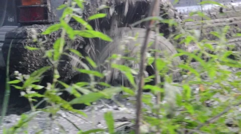 Slow muddy tyre Stock Footage 67442546
