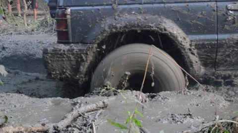 Slow muddy tyre Stock Footage 67442822