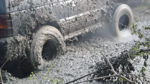 Slow muddy tyre Stock Footage 67443024
