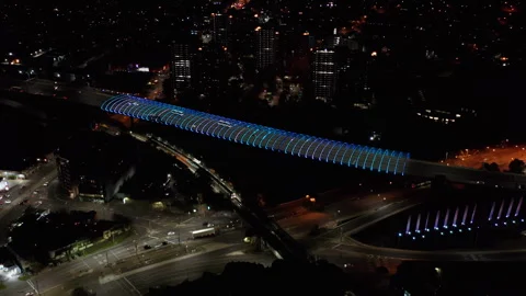 Slow Orbit at Night Over North Melbourne Freeway &amp; Intersections With Light Show Stock Footage 249515467
