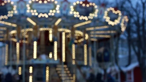 Slow, out of focus lights on a Carousel at night Stock Footage 81096845