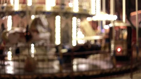 Slow, out of focus lights on a Carousel at night Video stock 82442412