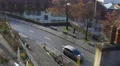 Slow paced life in small provincial town, few cars driving, busy people walking HD Footage