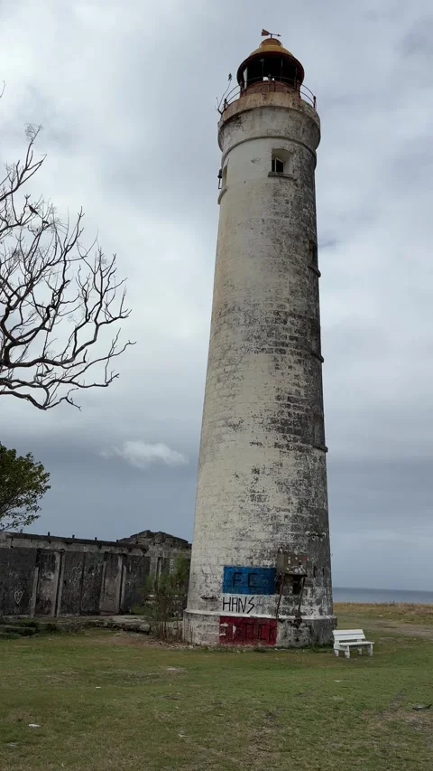 Slow Pan: Abandoned Historic Lighthouse and Caribbean Sea, Barbados Stockbeeldmateriaal 338410830