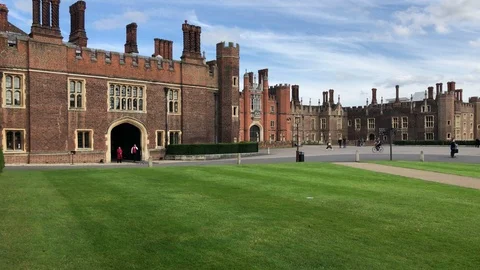 Slow Pan across front of Hampton Court Palace Stock Footage 110887367