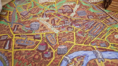 Slow pan across a historical map of the city of ancient Rome. Stock Footage 314668792