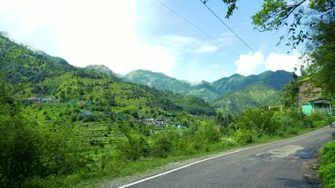 Slow Pan Across Lush Green Himalayan Mountains in Dhanaulti, Uttarakhand, In Stock Footage 339851701