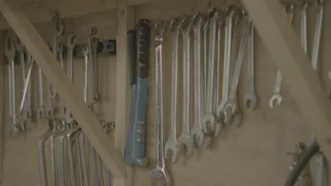 Slow pan across tools in workshop Stock Footage 179946993