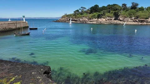 Slow Pan Across Turquoise Harbor in Douarnenez, Brittany, France Stock Footage 340586312