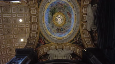 Slow pan along the ceiling of the aisle of St Peter's Basilica in Rome Stock Footage 159957199